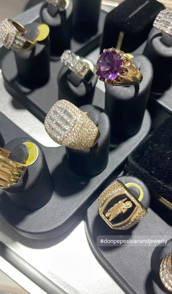 Gold and diamond rings in the display case at Don Pepes Loan & Jewelry in Stockton